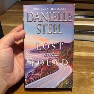Danielle Steel "Lost and Found" Paperback - Coastal Sunset Cover (Purple/Pink)